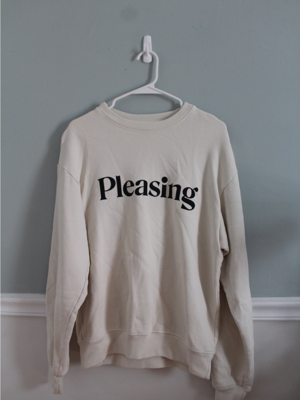 Harry Styles’ Pleasing Logo Crewneck Sweatshirt in Cream